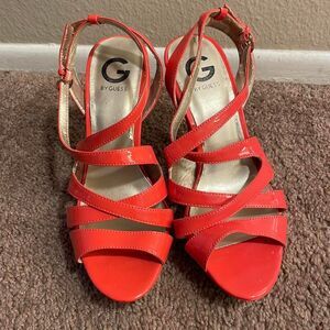 Shiny strapped orange heels